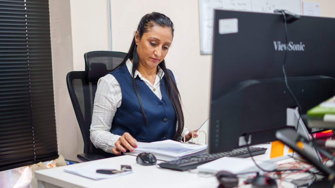 A Fertility2U pharmacist working securely at a clinical workstation